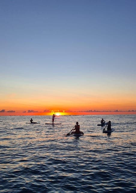 Paddleboarding at Sunrise or Sunset Gallery Image 2