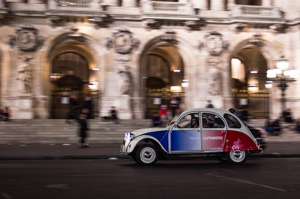 Discover Paris by Night in a Vintage Car with a Local Gallery Image 3