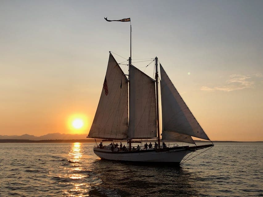 Tall Sailboat Sunset Harbor Cruise - Image 1