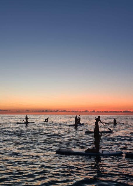 Paddleboarding at Sunrise or Sunset Gallery Image 4