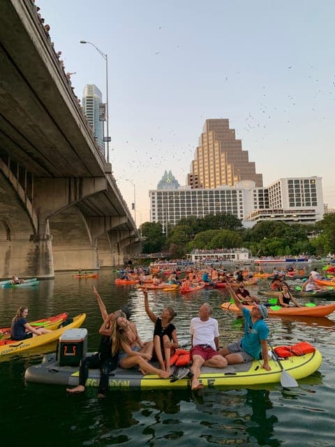 Giant Paddleboarding Tour Downtown at Sunset w/ Bats Gallery Image 4