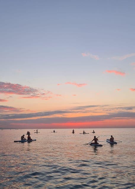 Paddleboarding at Sunrise or Sunset Gallery Image 1